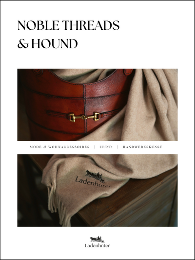 Lederkorb mit einer weichen Kaschmir Decke. Titelbild des Blogs Noble Threads & Hound. 